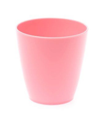 Empty pink plastic glass isolated on white background
