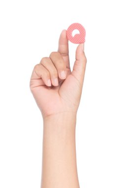 hand holding alphabet made from EVA foam isolated on white backg