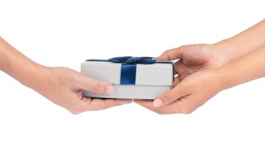 Hands giving and receiving a present isolated on white backgroun