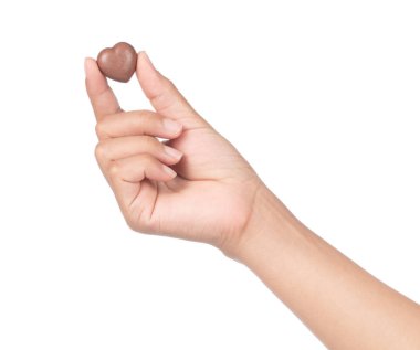 hand holding Chocolate heart isolated on a white background