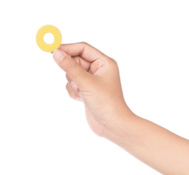 hand holding alphabet made from EVA foam isolated on white backg