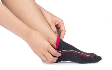 Closeup of woman wearing short socks isolated on white backgroun