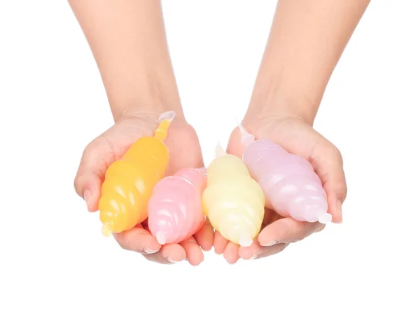 Hand holding Jelly in plastic containers shape ice cream isolate — Stockfoto