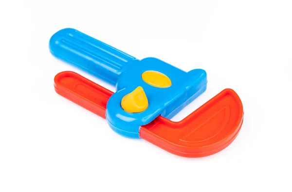 Llave de juguete de plástico aislada sobre fondo blanco —  Fotos de Stock