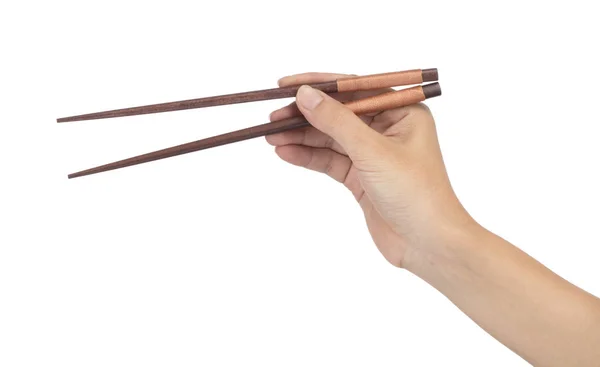 Hand holding Wooden chopsticks isolated on white background — Stock Photo, Image