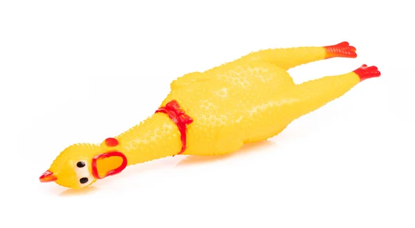 おもちゃゴムシェーク白い背景に隔離された黄色の鶏 — ストック写真
