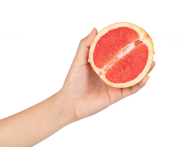 Hand holding ripe grapefruit slice isolated on white background. — Stock Photo, Image