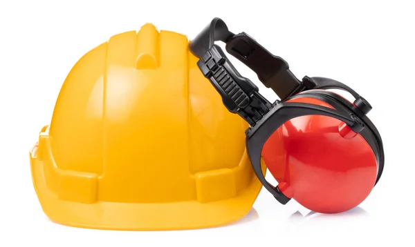 Headphone Segurança com capacete de construção isolado na parte traseira branca — Fotografia de Stock