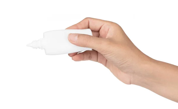 Mão segurando frasco protetor solar isolado no fundo branco. — Fotografia de Stock