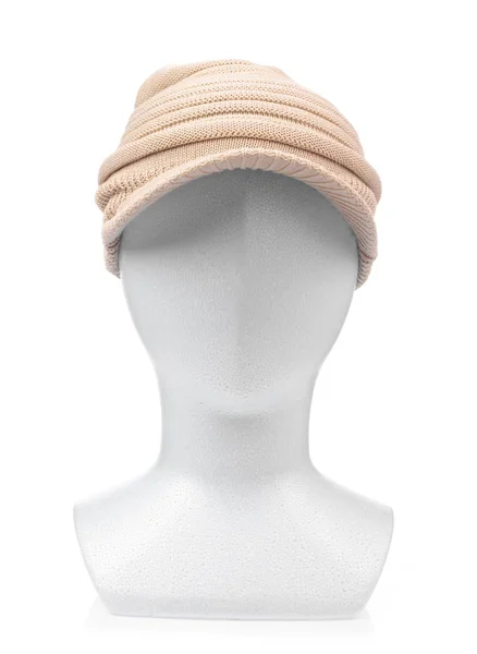 Brown knitted wool hat on model mannequin head isolated on white — 图库照片