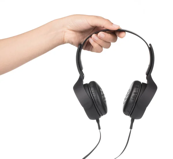 Hand hält Kopfhörer isoliert auf weißem Hintergrund — Stockfoto