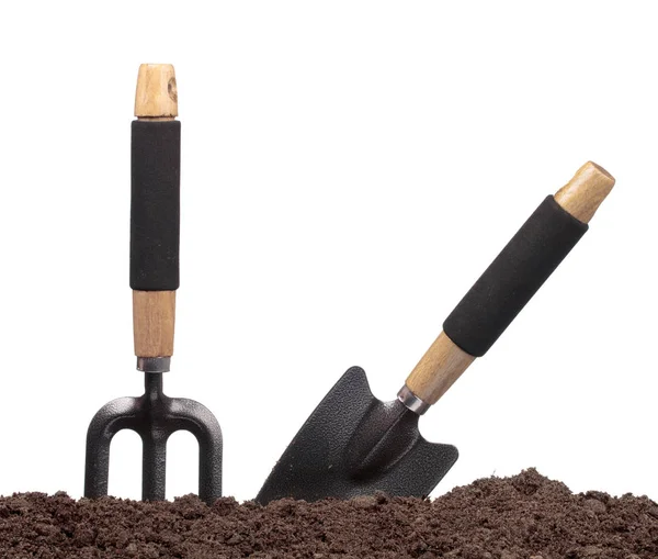 Set garden tools in soil isolated on white background — Stock Photo, Image