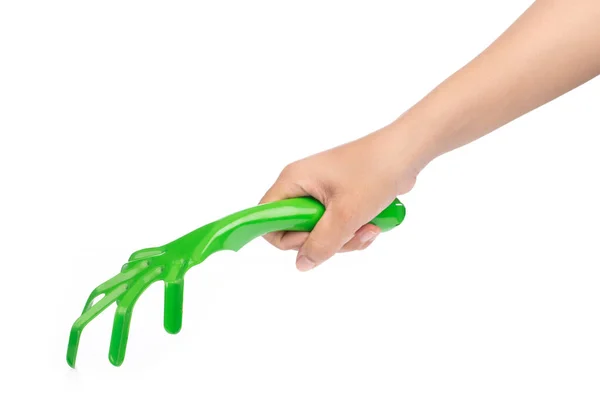 Hand holding Green Garden rake isolated on white background — Stock Photo, Image