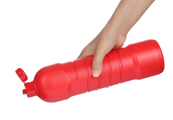 Mão segurando frasco limpador de plástico isolado no fundo branco — Fotografia de Stock