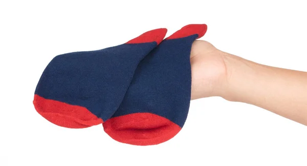 Hand hält kurze Socken isoliert auf weißem Hintergrund — Stockfoto