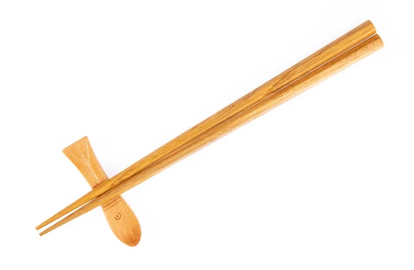 Pair of wood chopsticks with wood holder isolated on a white bac — 스톡 사진