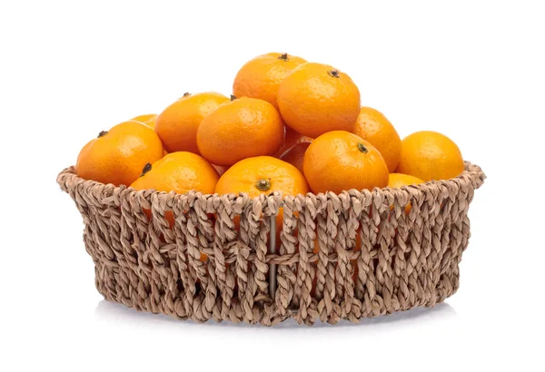 Orange in basket isolated on white background — Stok fotoğraf