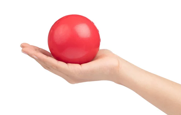 Mão segurando bola brinquedo isolado no fundo branco — Fotografia de Stock