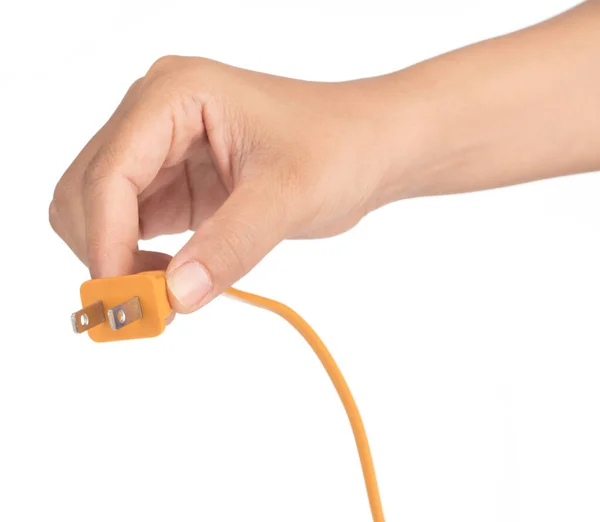 Hand holding electrical plug and electrical cord isolated on whi — 图库照片