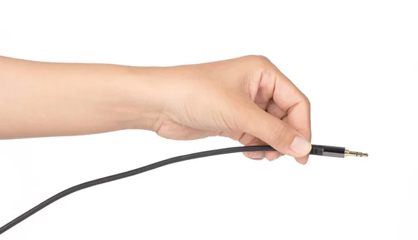 Hand håller Mono Plug Audio Connector isolerad på vit bakgrund — Stockfoto