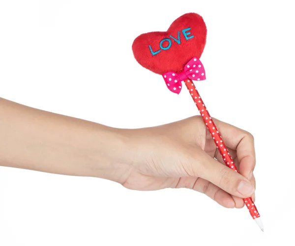 Hand holding Lovely Heart plush pen isolated on white background — Stock Photo, Image