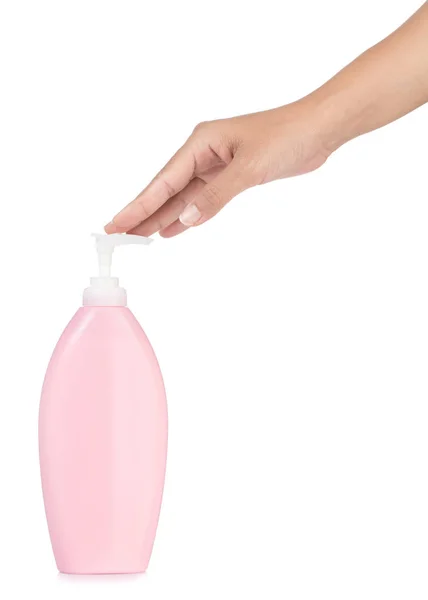 Mani pompaggio fuori crema da bottiglia isolato su sfondo bianco — Foto Stock