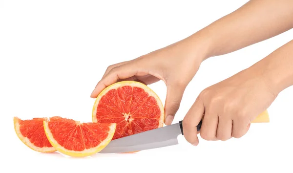 Weibliche Hände Schneiden Reife Grapefruit Isoliert Auf Weißem Hintergrund — Stockfoto