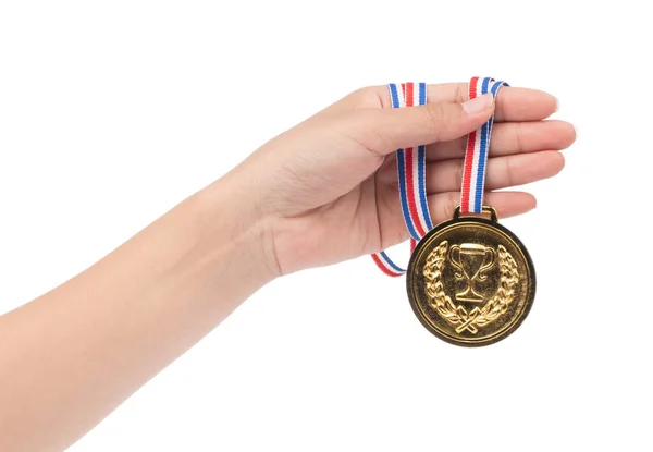 Vencedor mão levantada e segurando medalha de ouro com isol fita — Fotografia de Stock