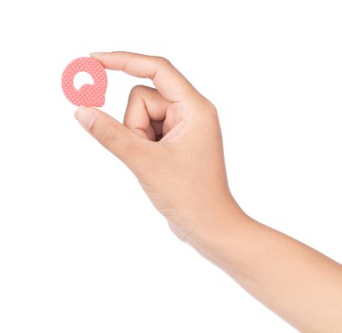 hand holding alphabet made from EVA foam isolated on white backg