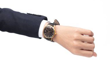 closeup luxury watch on wrist of man isolated on a white backgro