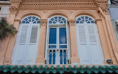 colored wood windows of the building colorful background.