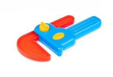 plastic toy wrench isolated on white background