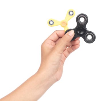 hand holding two fidget spinner isolated on a white background