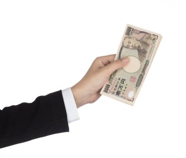 Businesswoman giving money and holding 10,000 japanese yen money
