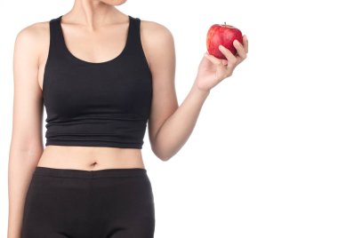 Young slim woman holding red apple. Isolated on white background