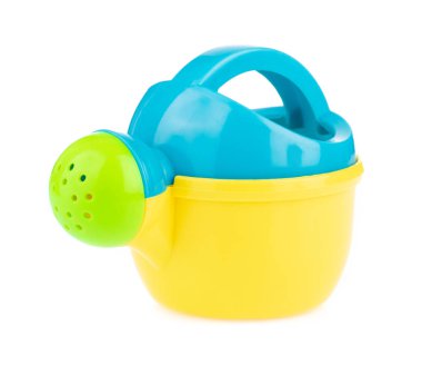 close up of toy watering can isolated on white background