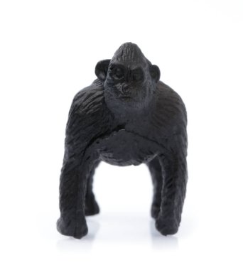 Plastic toy Baboon monkeys isolated on white background.