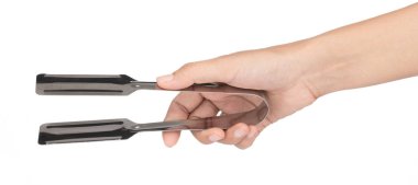 Beyaz arka planda el ele tutuşan mutfak maşaları..