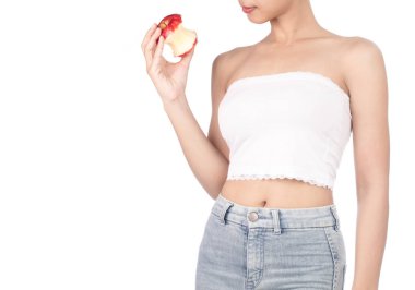 young woman wearing white strapless dress and jeans bite red app