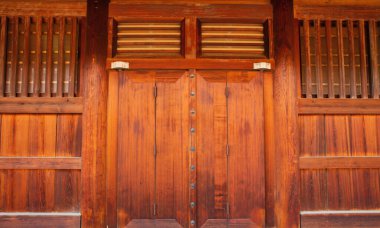 Closed wooden door as background