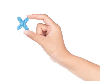 hand holding alphabet made from EVA foam isolated on white backg