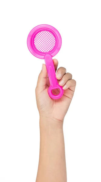 Hand holding Toy plastic pink of shovel isolated on a white back — 图库照片