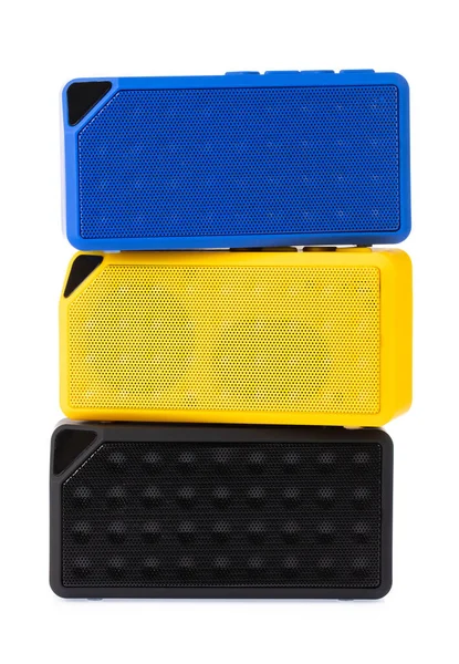 Mini Bluetooth amarillo azul y negro altavoz aislado en blanco b —  Fotos de Stock