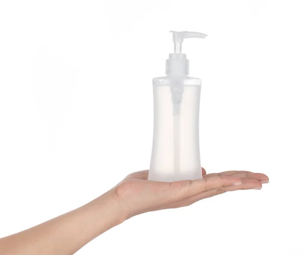 Hand holding Plastic bottle pump head isolated on white backgrou — Stockfoto