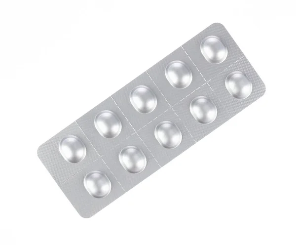 Antipyretic tablets in foil blister pack,  isolated on white bac — ストック写真