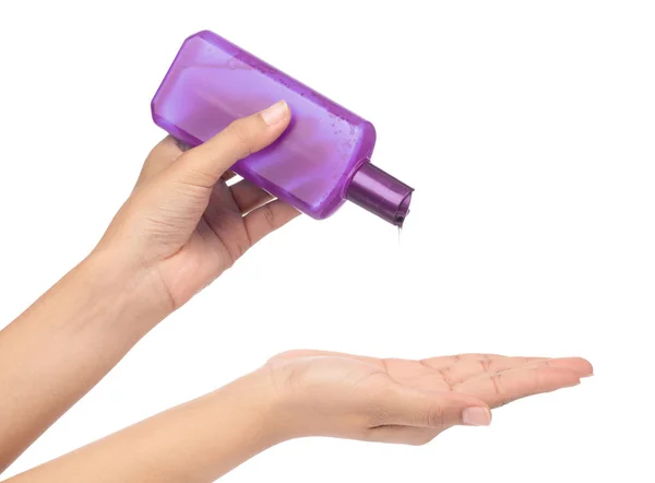 Hand houden van een fles product cosmetische voor huidverzorging geïsoleerd op — Stockfoto