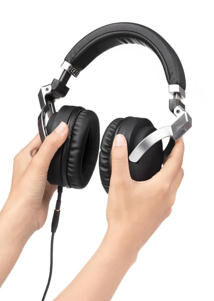 Hand holding Headphones Isolated on White Background — Stock Photo, Image