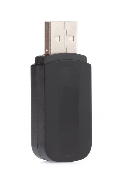 Um preto de memória flash USB isolado em um fundo branco . — Fotografia de Stock