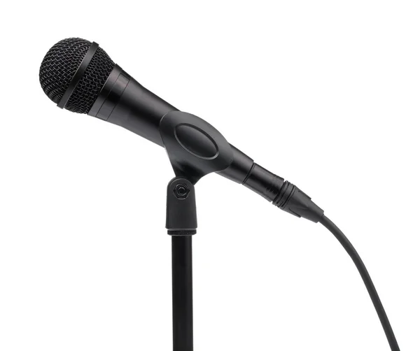 Microfone e ficar isolado em um fundo branco — Fotografia de Stock