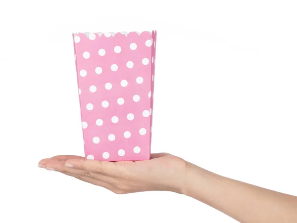 Hand holding Popcorn paper box isolated on white background — Stockfoto